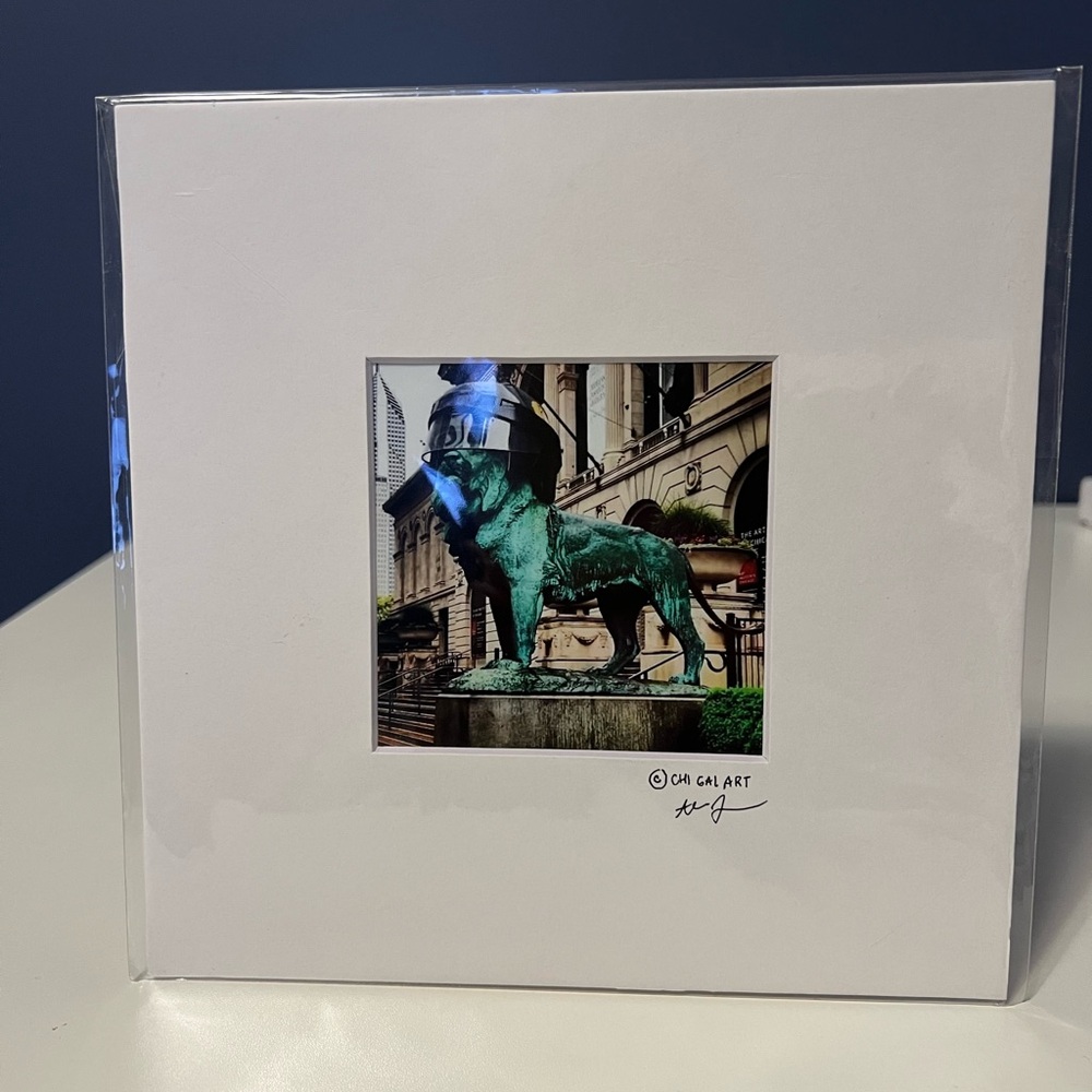 AIC Lion wearing Chicago Blackhawk Helmet by ChiGalArt 4x4”photo in 8x8”